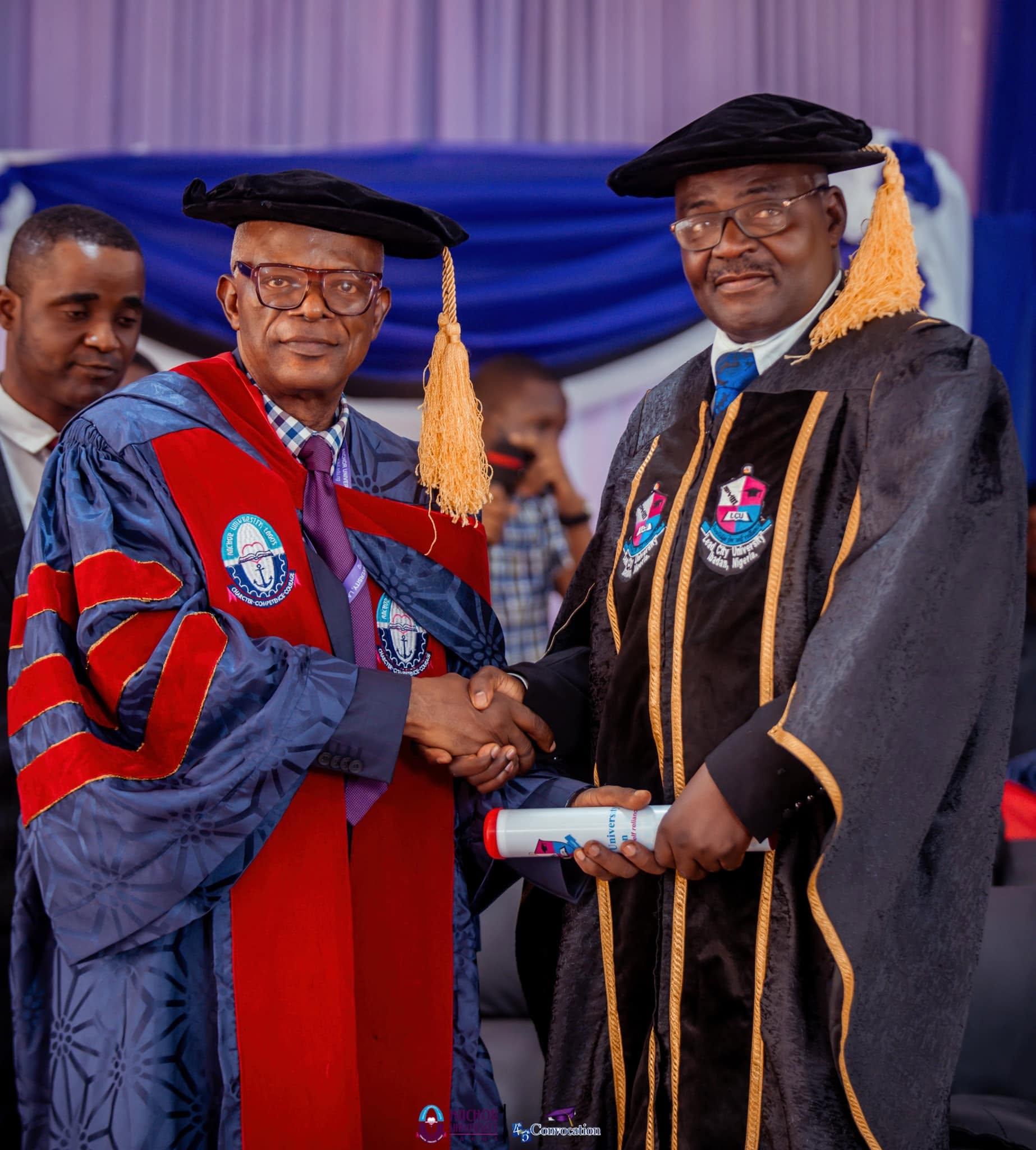 Anchor University postgraduate graduates and faculty leaders