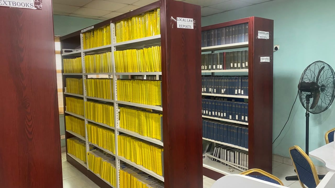 Shelves of local and foreign law reports and statutes in the Law Library