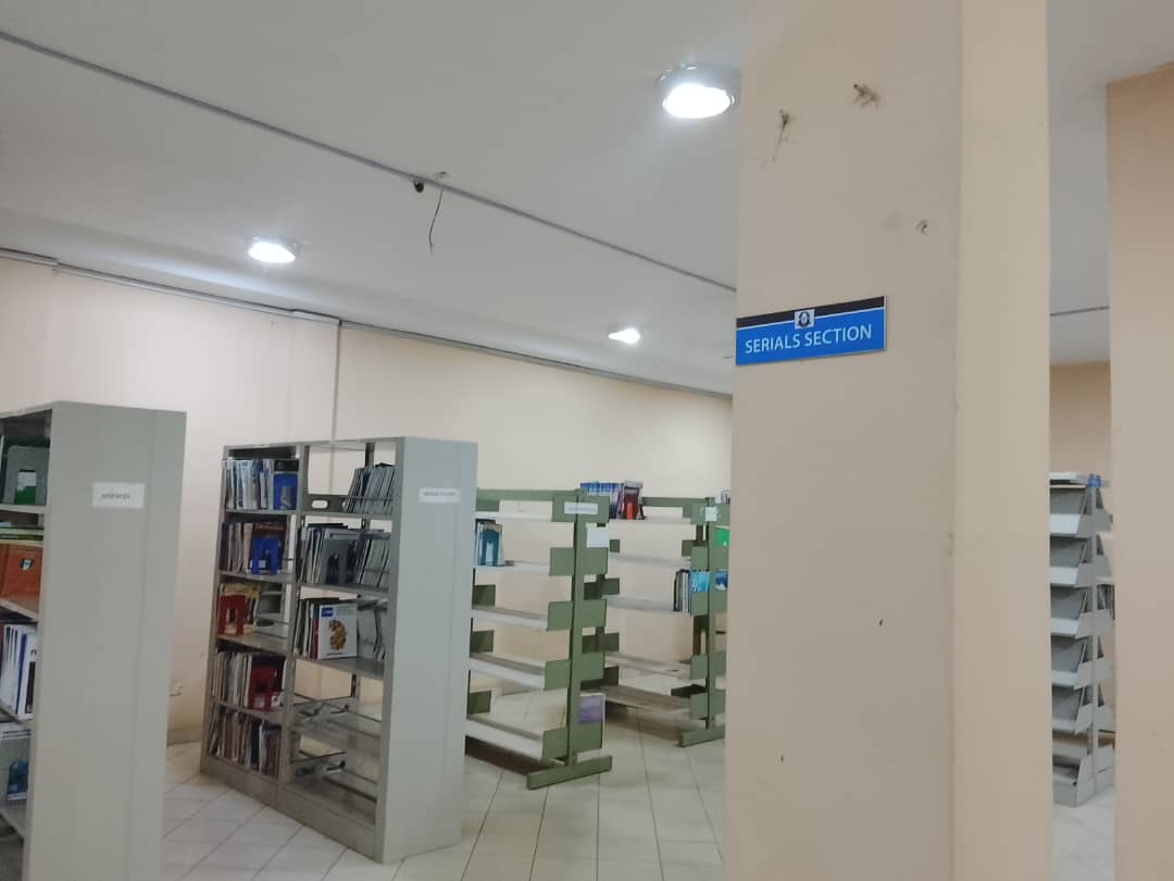 Shelving under the Serials Section sign in the main library