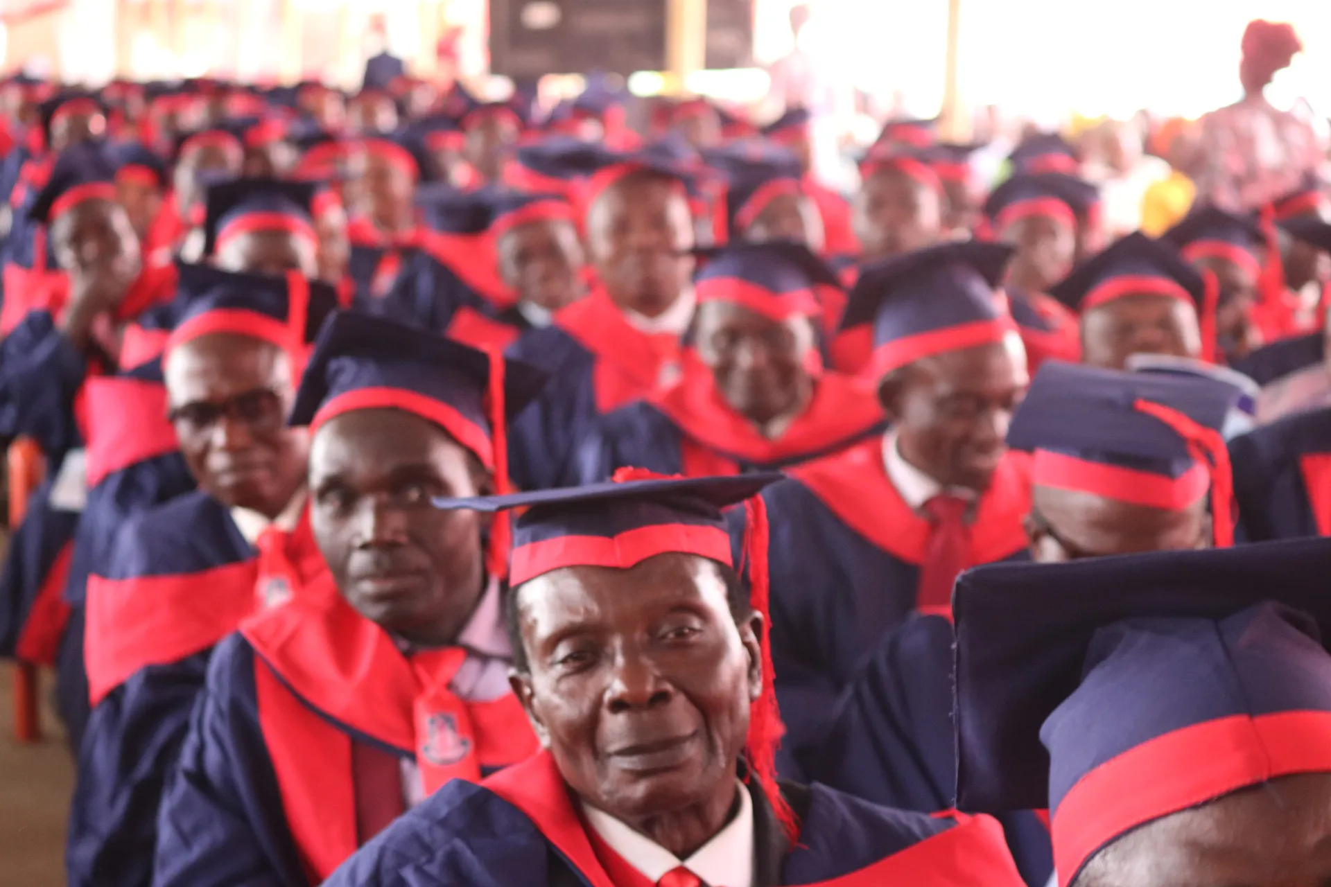 Attendees in academic regalia at an IBTC affiliation ceremony