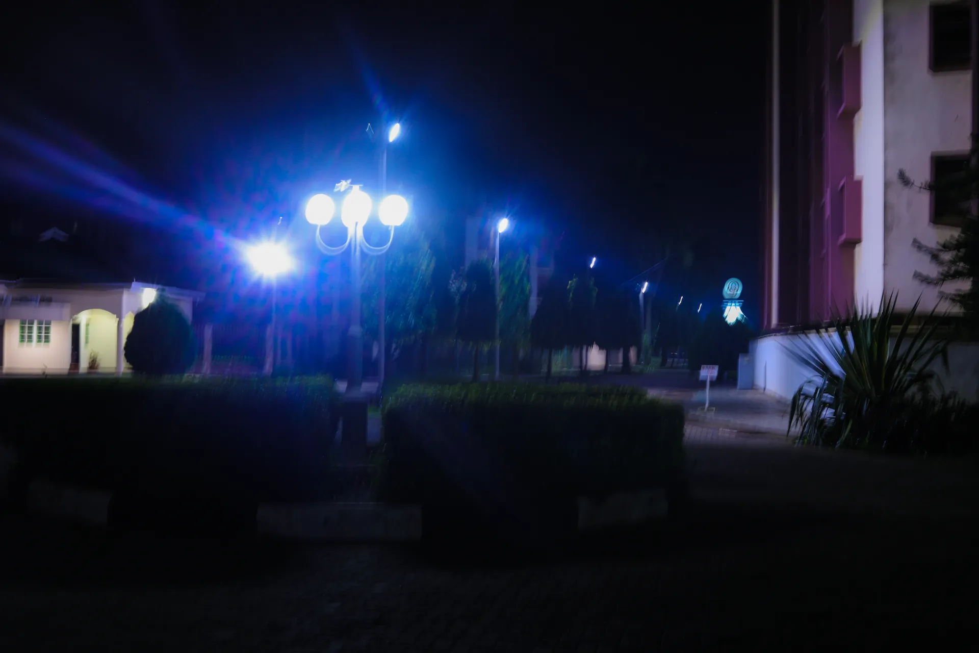 Campus grounds illuminated at night