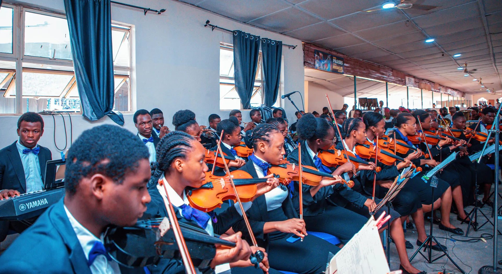Orchestra performing with string instruments