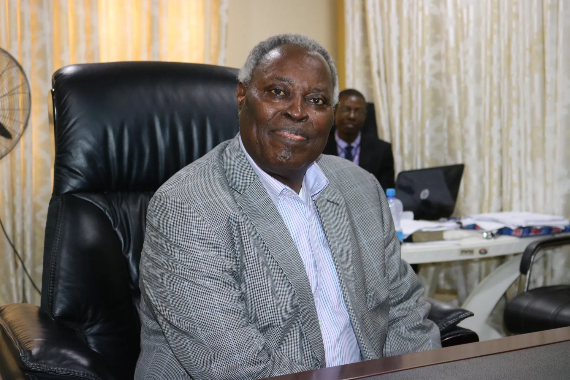 Chancellor seated in an office