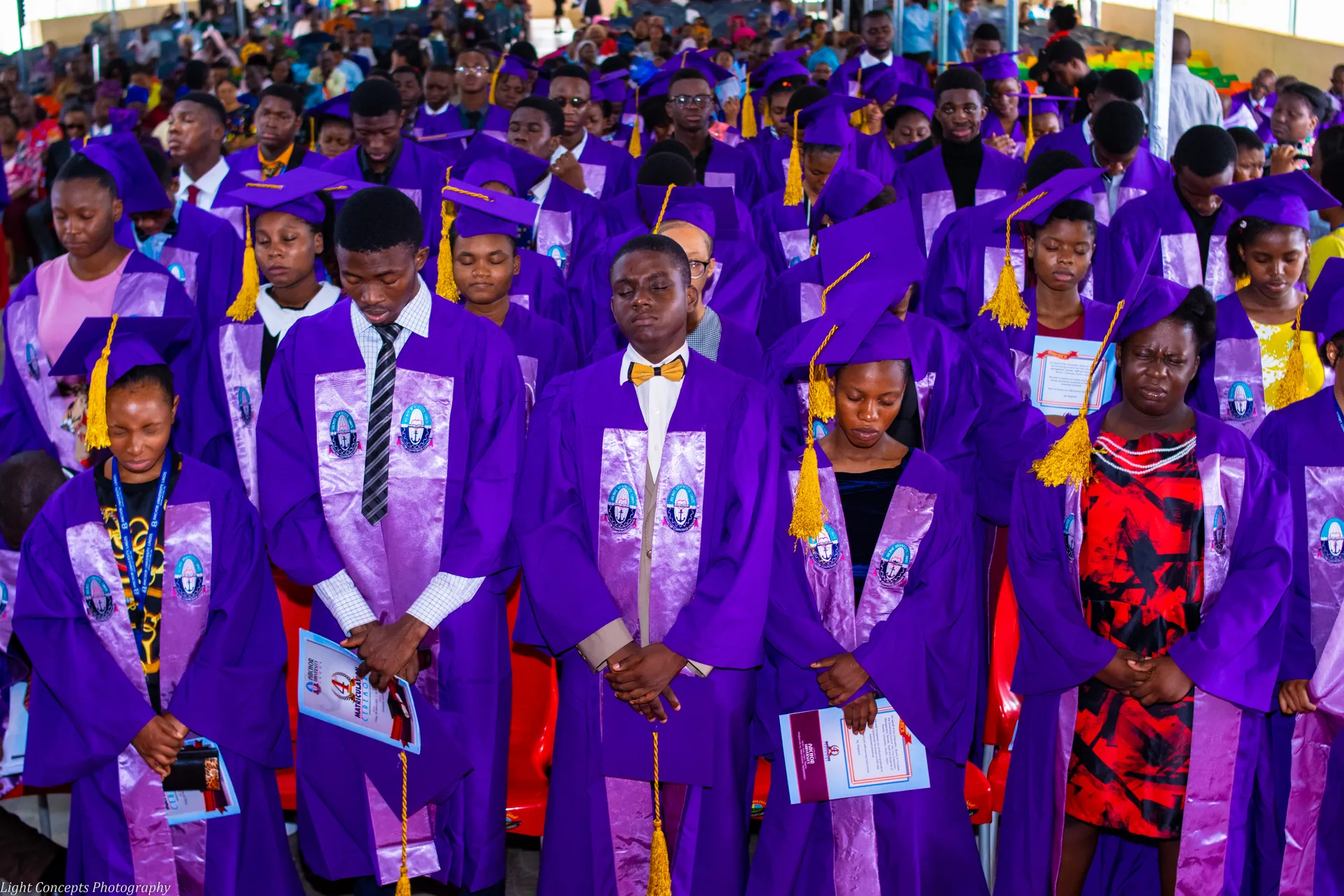 Students standing during a matriculation ceremony