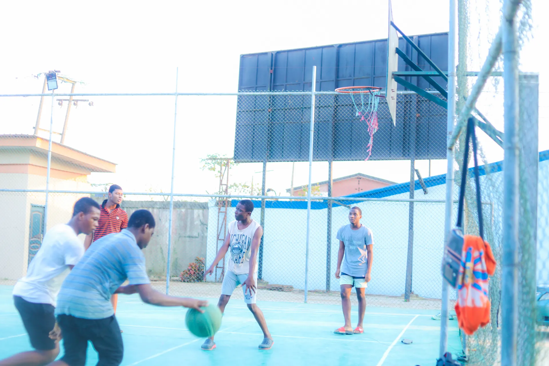Basketball players moving towards the basket